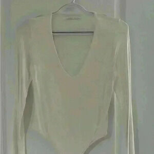 Seven Sisters white long sleeve v-neck body suit fits size small to  medium
